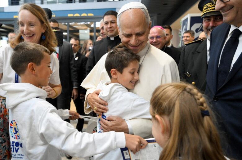 Pope Leo XIV embraces a child at the Metz–Nancy–Lorraine Airport, in Goin, on the last day of his four-day visit to France, Sept. 28, 2026. (OSV News photo/Simone Risoluti, Vatican Media)