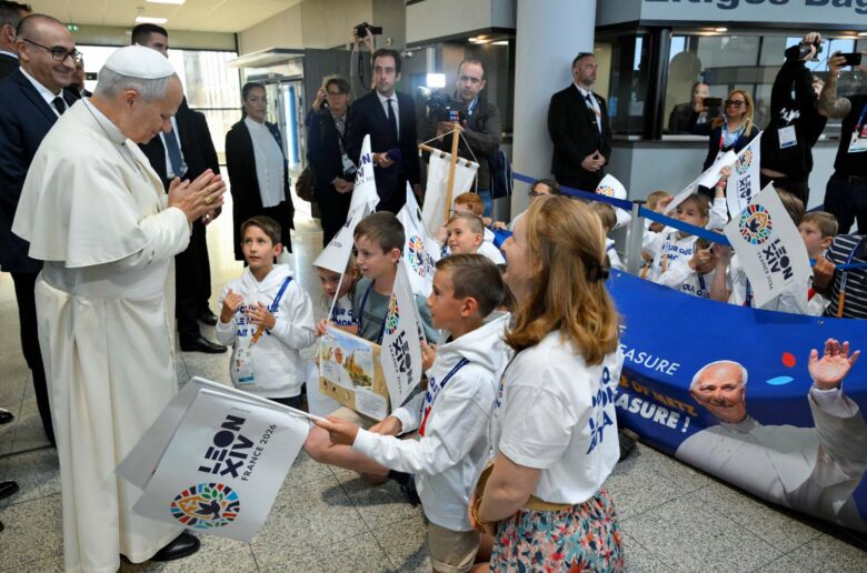 Pope Leo XIV interacts with children at the Metz–Nancy–Lorraine Airport, in Goin, on the last day of his four-day visit to France, , Sept. 28, 2026. (OSV News photo/Simone Risoluti, Vatican Media)