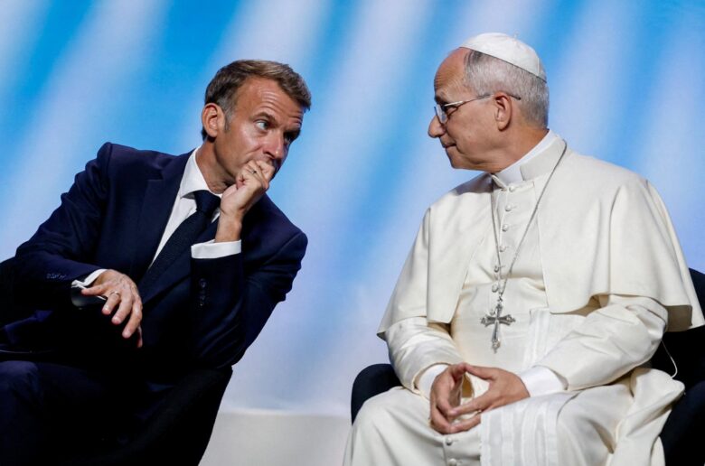 French President Emmanuel Macron and Pope Leo XIV speak as they attend a meeting titled "At the Roots of Europe for Peace and Unity" at the Robert Schuman convention center in Metz Sept. 28, 2026, as part of Pope Leo's four-day apostolic journey to France. (OSV News photo/Remo Casilli, Reuters)