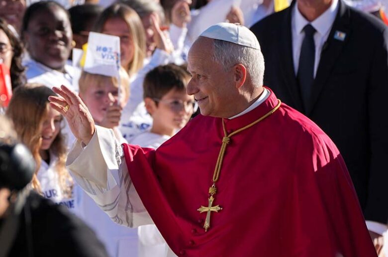 Pope Leo XIV greets a group of children as he arrives at Paris Orly International Airport Sept. 25, 2026, at the start of his apostolic journey to France and visit to UNESCO. (CNS photo/Lola Gomez)