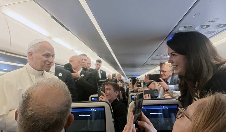 Pope Leo XIV responds to a question about Blessed Fulton J. Sheen asked by OSV News Vatican editor Courtney Mares aboard the papal plane to France Sept. 25, 2026. (OSV News photo/Claudio Lavanga, Vatican journalists' pool)