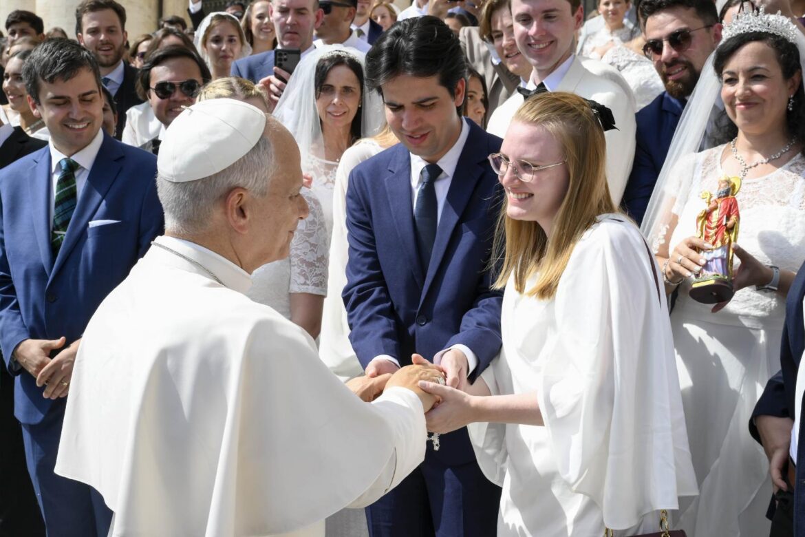 Pope Leo XIV greets a newlywed couple in St. Peter’s Square at the Vatican after his weekly general audience Sept. 9, 2026. An Oct. 2 press conference at the Holy See Press Office presented details of the upcoming meeting between the pope the presidents of episcopal conferences, titled "Ten years after Amoris Laetitia: proclaiming the Gospel with families today." (CNS photo/Vatican Media)