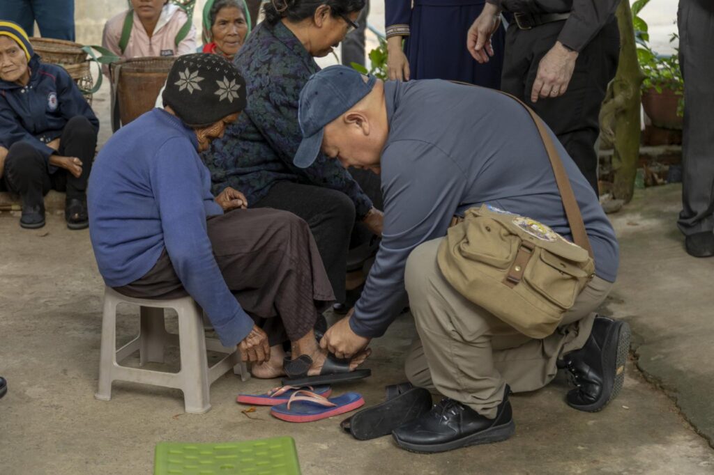 Missionaries from the Pontifical Mission Societies USA distribute custom sandals to victims of Hansen’s disease, commonly known as leprosy, in a remote leper colony in the Diocese of Kon Tum, central Vietnam, April 7, 2025. Catholics around the world will mark World Mission Sunday Oct. 18, 2026. (OSV News photo/Margaret Murray)