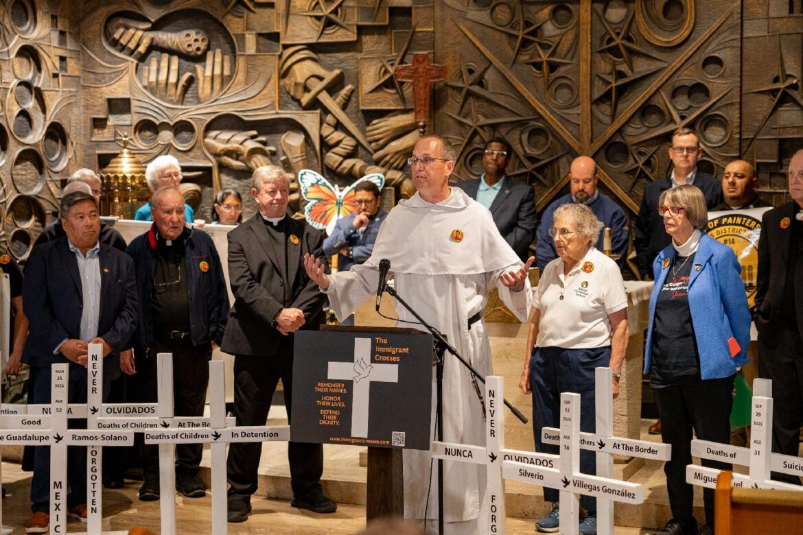 Surrounded by other members of the clergy and supporters of Immigrant Crosses, Father Brendan Curran speaks on human dignity and condemns Immigration and Customs Enforcement operations at Holy Name Cathedral in Chicago Sept. 24, 2026, during the launch of the traveling memorial. Father Curran is a Dominican and a member of Priests for Justice for Immigrants. (OSV News photo/Hailey Hoffman)