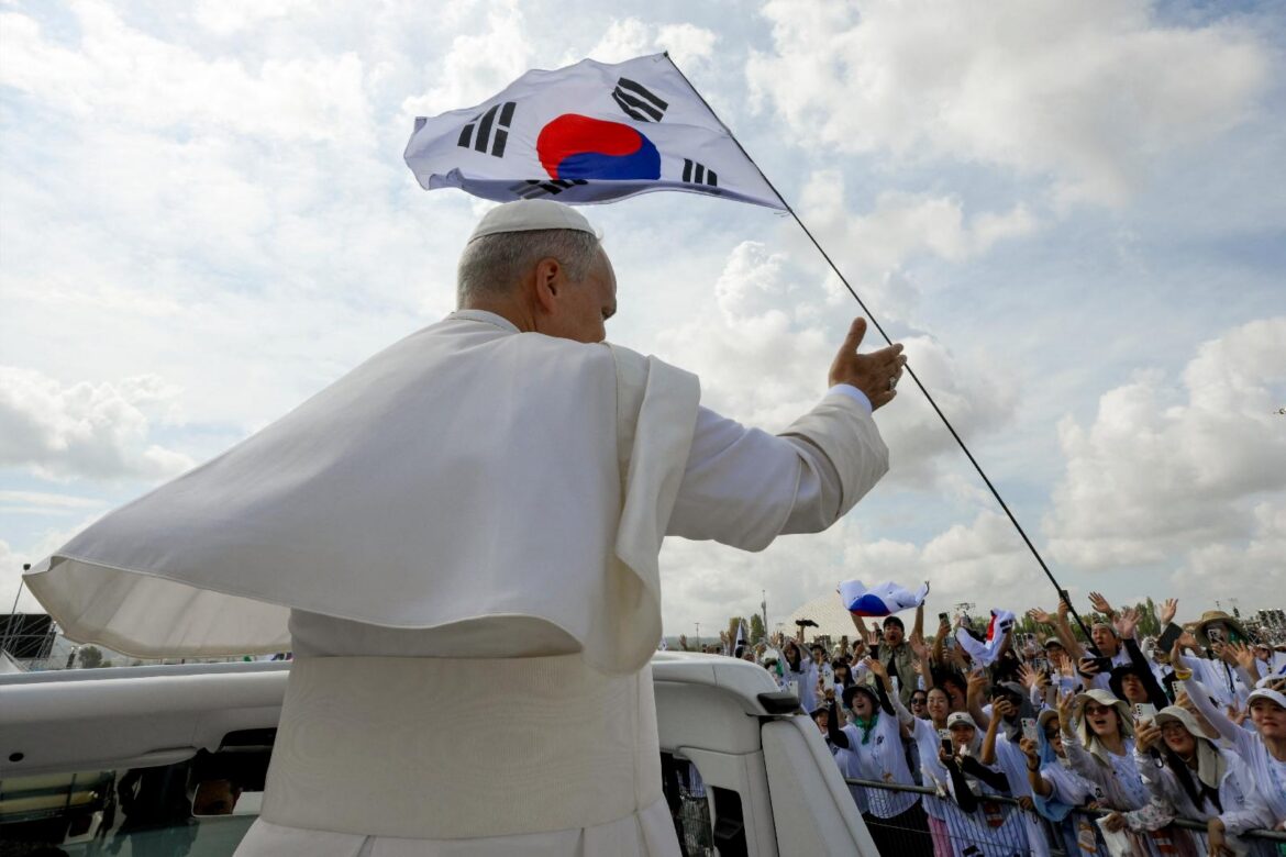 A South Korean flag is seen as Pope Leo XIV gestures to pilgrims Aug. 3, 2025, the day of the closing Mass for the Jubilee of Youth at the Tor Vergata open-air field in Rome. On Oct. 22, 2026, the pope launched the opening of registrations for the 41st World Youth Day set to take place Aug. 3–8, 2027, in Seoul, South Korea. (OSV News photo/Vatican Media via Reuters)
