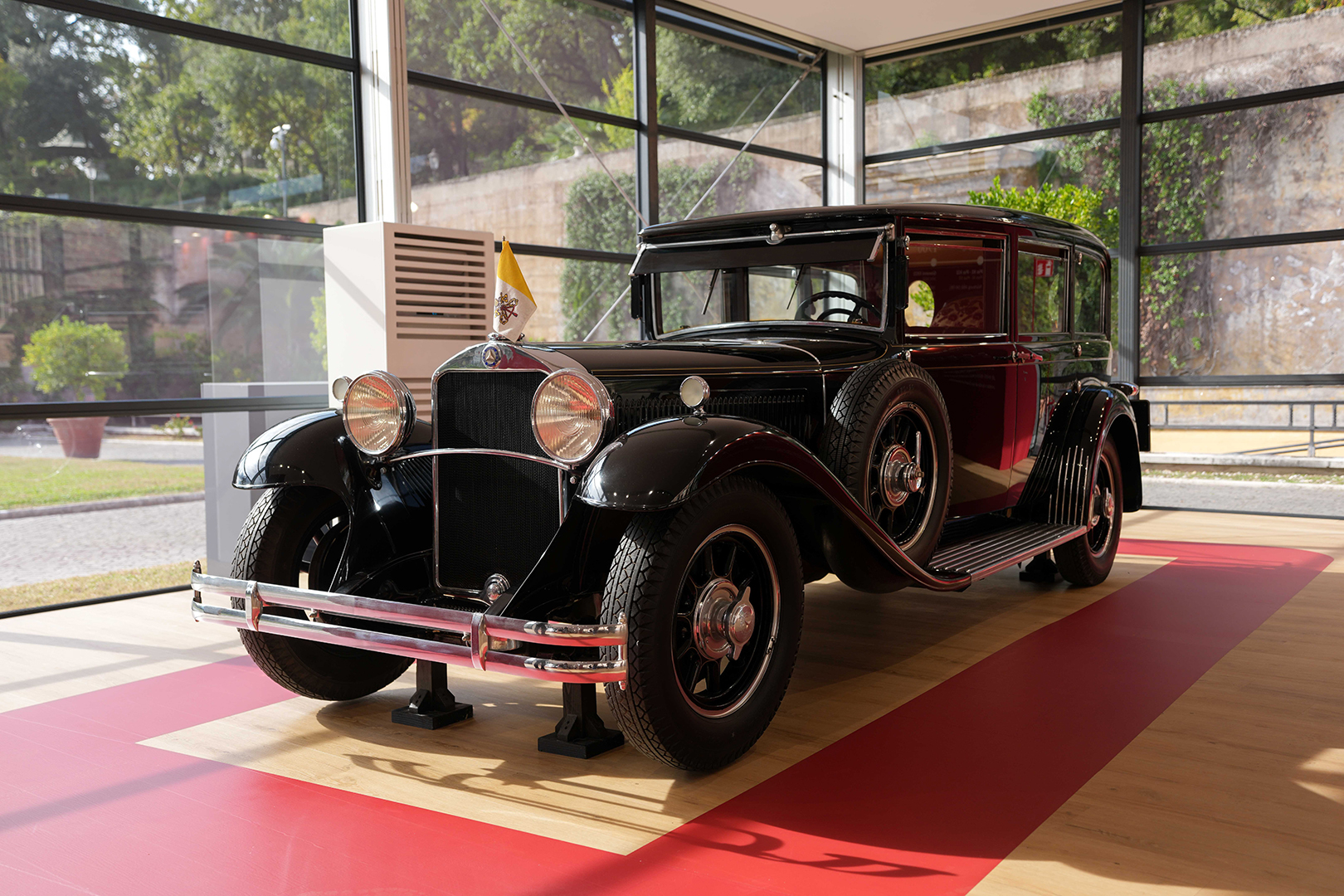 A 1930 Mercedes-Benz Nürburg 460, the first car regularly used by a pope, is displayed during the inauguration of the exhibition “A Century of Popemobiles” at the Vatican Museums Oct. 28, 2026. The limousine, specially tailored for Pope Pius XI, marked the beginning of a nearly century-long relationship between Mercedes-Benz and the Vatican. (CNS